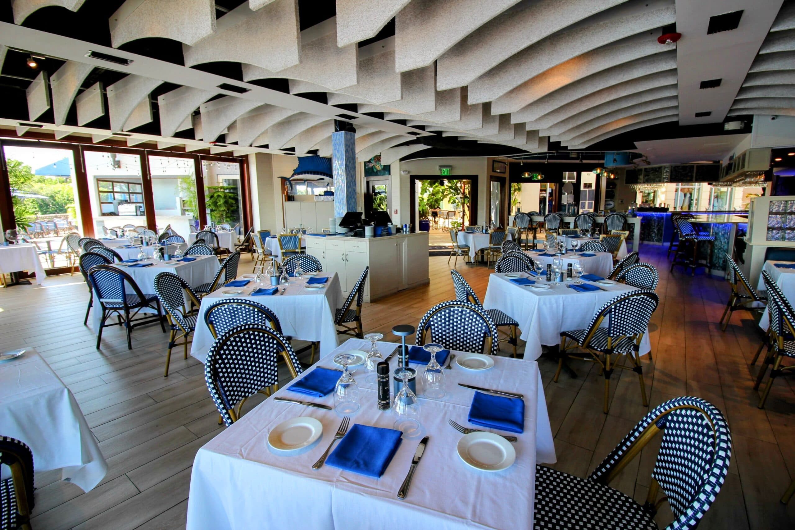 Waterfront dining at dusk on Venetian Bay, Naples
